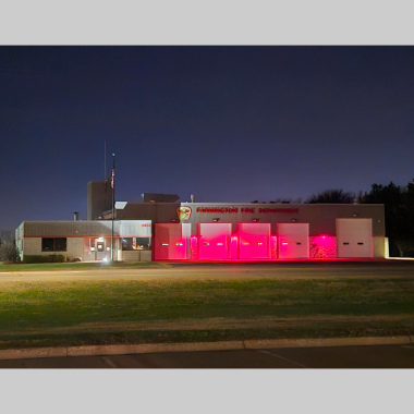 Light the Night with red lights on Fire Station 1 at night for fallen firefighters