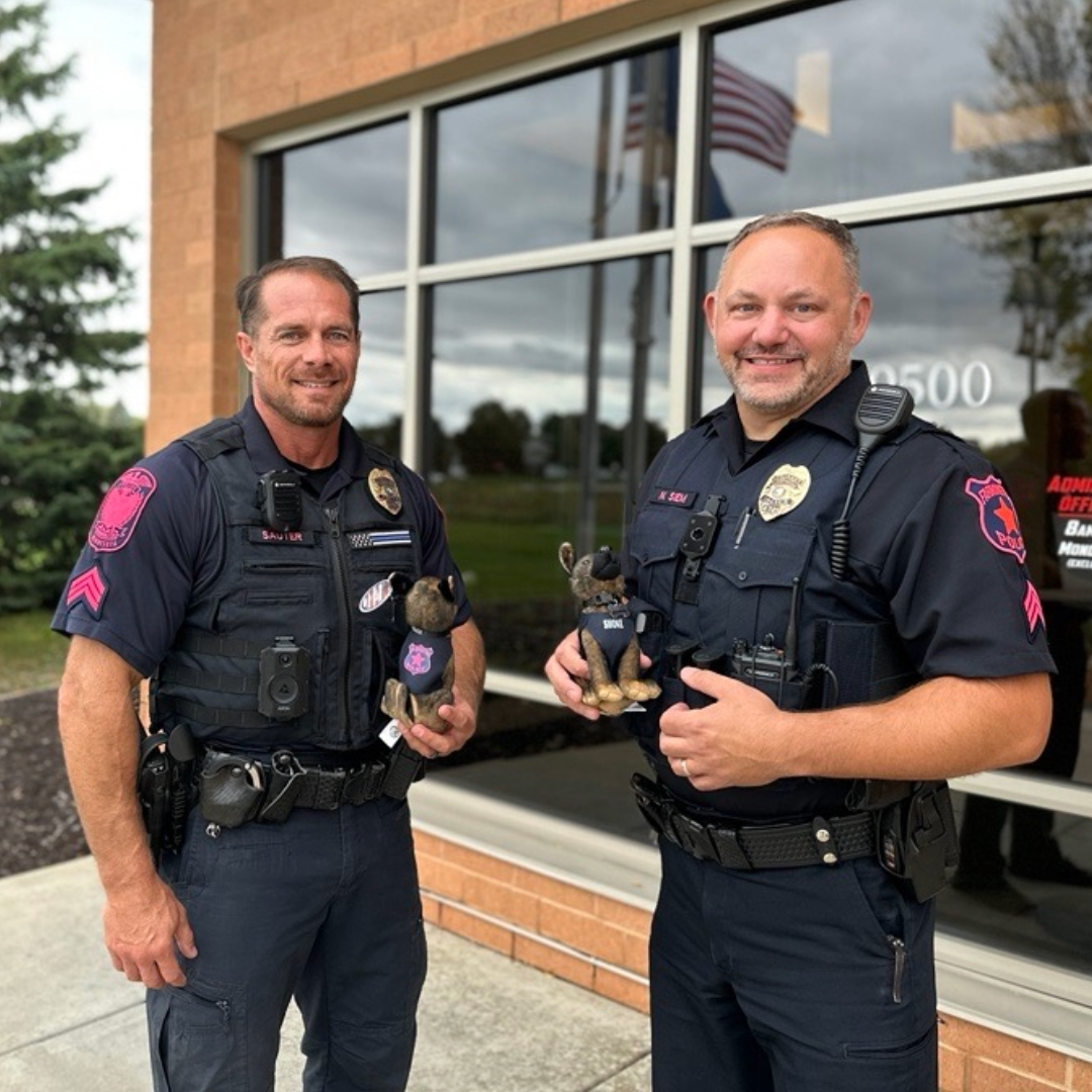 Pink Patch Project with Sergeants Siem and Sauter holding mini Smoke in their pink